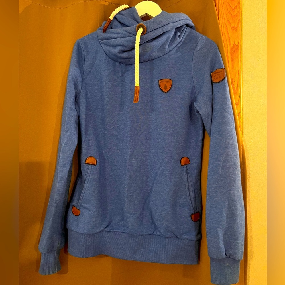 Rarely worn, thick sweatshirt. It’s warm! Light staining under cowl in last pic